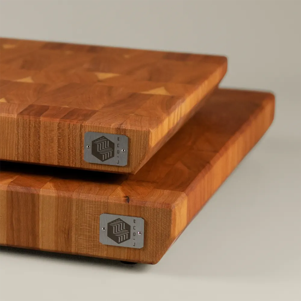 <div class="titlecerezo"> <p class="second-name">Pura</p> Cerezo <p class="hidekey"> tabla de cortar de cerezo</p></div> imagen principal del producto