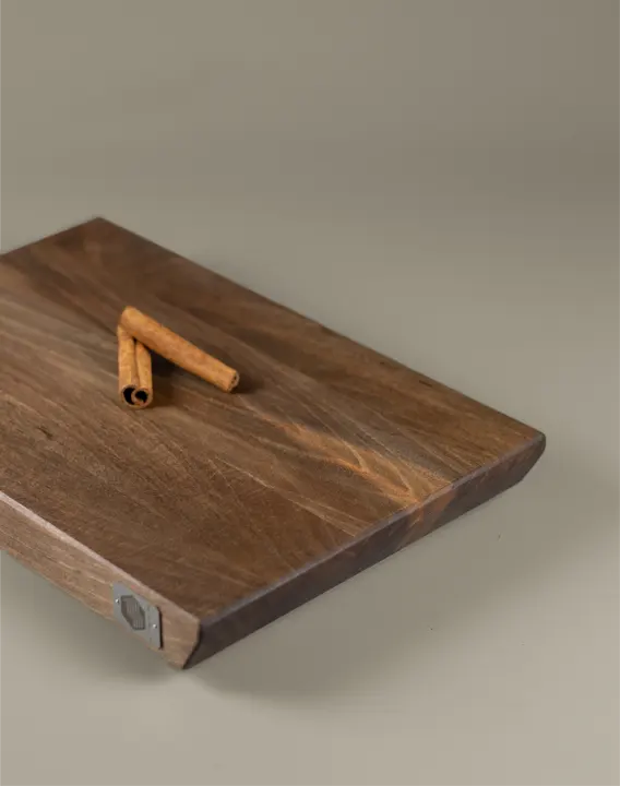 <div class="titlenogal"><p class="second-name">Linea</p> Nogal <p class="hidekey"> tabla de nogal a veta</p></div> imagen de la galería del producto