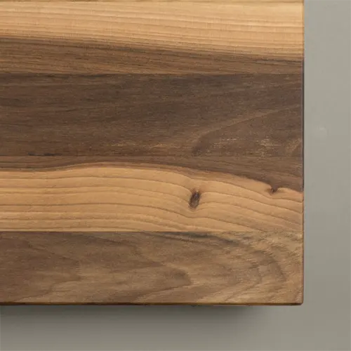 <div class="titlenogal"><p class="second-name">Linea</p> Nogal <p class="hidekey"> tabla de nogal a veta</p></div> imagen de la galería del producto