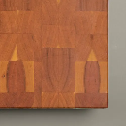 <div class="titlecerezo"> <p class="second-name">Pura</p> Cerezo <p class="hidekey"> tabla de cortar de cerezo</p></div> imagen de la galería del producto